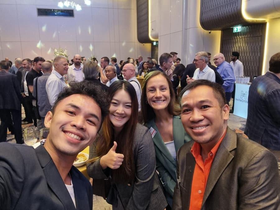 TRG International team members smiling