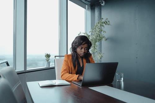 Confident finance leader working in a modern office