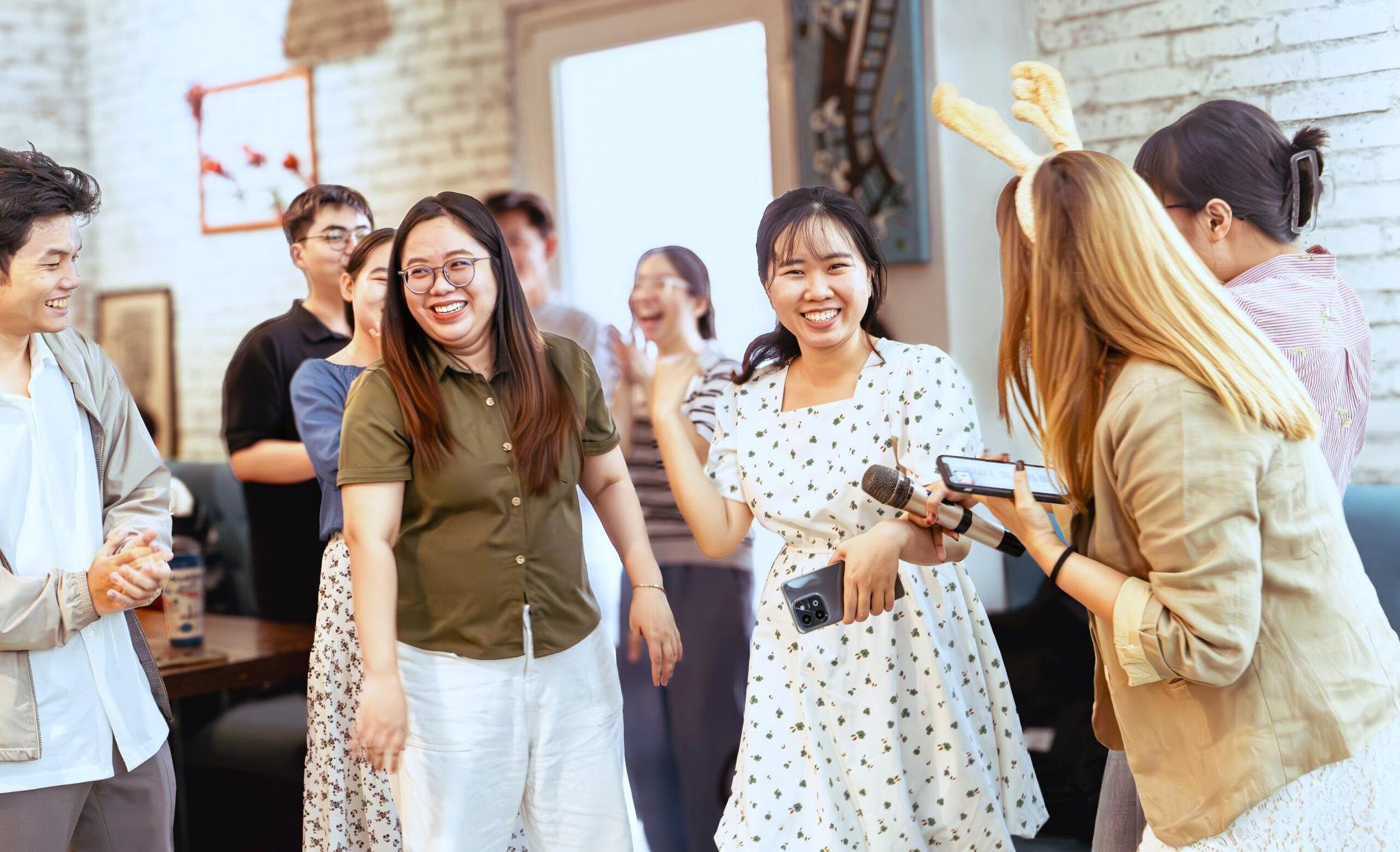 TRGers laughing together at an Ice Breaking session